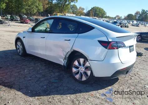 2023 Tesla Model Y Awd/Long Range Dual Motor All-Wheel Drive z USA, uszkodzony, nr VIN 7SAYGDEE9PA052958